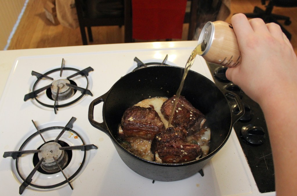 Beer braised beef short ribs in a Dutch oven